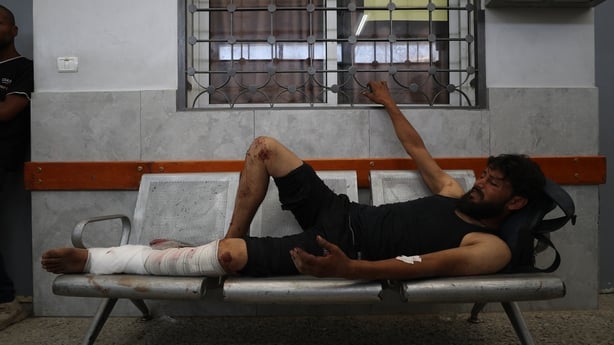 GAZA CITY, GAZA - JUNE 11: (EDITORS NOTE: Image depicts graphic content) Palestinians who were killed or injured in an Israeli attack are brought to Al-Shifa hospital for treatment and burial process in Gaza City, Gaza on June 11, 2025. (Photo by Mahmoud Issa/Anadolu via Getty Images)