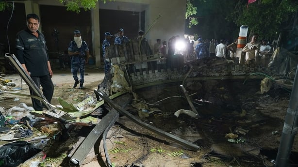Resuce workers at the crash site of Air India Ltd. Flight 171 in Ahmedabad, Gujarat, India, on Thursday, June 12, 2025. An Air India Boeing Co. 787 aircraft traveling from Ahmedabad in India to London's Gatwick airport crashed shortly after taking off, in what stands to be the most serious accident