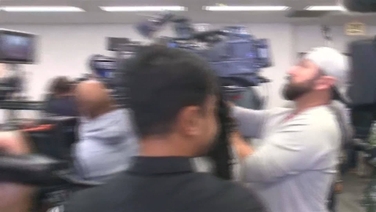 US senator forcibly removed from Trump official's press conference