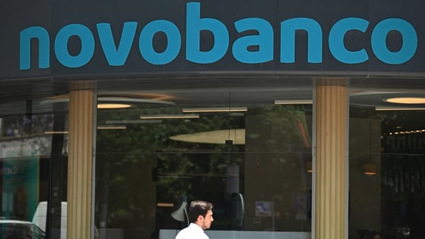 A Novo Banco SA bank branch in Lisbon, Portugal, on Monday, June 9, 2025. Lone Star’s Portuguese lender Novo Banco attracted two bids from French banking group BPCE and CaixaBank SA of Spain, according to people familiar with the matter. Photographer: Zed