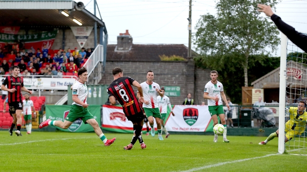 13 June 2025; Dayle Rooney of Bohemians shoots to score his side's second goal during the SSE Airtricity Men's Premier Division match between Cork City and Bohemians at Turner's Cross in Cork. Photo by Michael P Ryan/Sportsfile