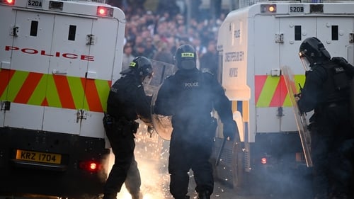 PSNI officers in riot gear respond to civil unrest in Ballymena on Wednesday night