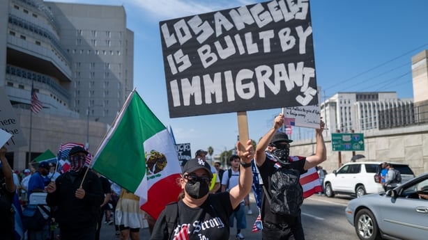 LOS ANGELES, CALIFORNIA - JUNE 13: Protesters confront law enforcement outside of a federal building and Immigration and Customs Enforcement (ICE) detention center on June 13, 2025, in Los Angeles, California. Demonstrations continue after a series of immigration raids began last Friday, June 6th. T