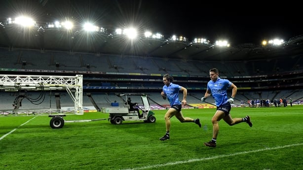 15 November 2020; Dublin players David Byrne, left, and Brian Howard go through a running session, as heat lamps are brought on the pitch, after the Leinster GAA Football Senior Championship Semi-Final match between Dublin and Laois at Croke Park in Dublin.