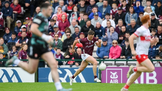 18 May 2024; Shane Walsh of Galway makes a break as Derry goalkeeper Odhran Lynch, left, runs back to his goal during the GAA Football All-Ireland Senior Championship Round 1 match between Galway and Derry at Pearse Stadium in Galway.