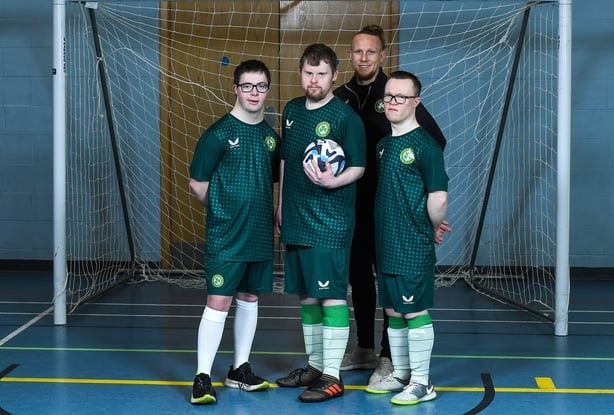 9 March 2025; Head coach Conor McKahey with from left Micheál McCloy, Jamie Linden and Kevin Trainer during a National Down Syndrome Futsal training session at Corduff Sports Centre in Dublin. Photo by Matt Browne/Sportsfile *** NO REPRODUCTION FEE ***