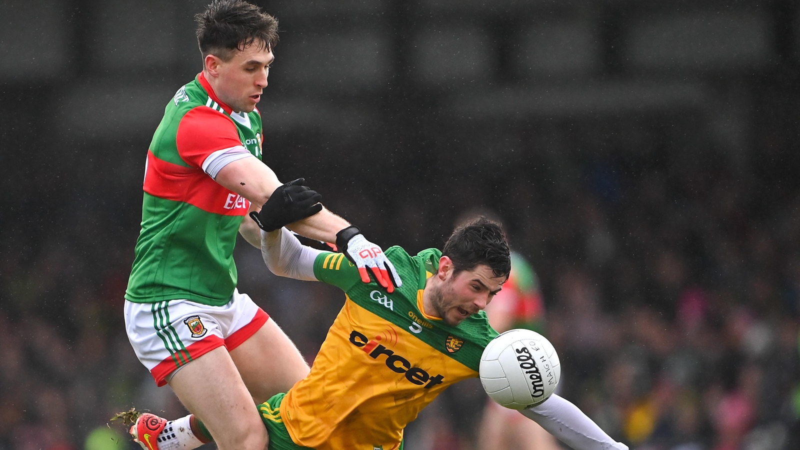 30 January 2022; Ryan McHugh of Donegal is fouled by Paddy Durcan of Mayo during the Allianz Football League Division 1 match between Mayo and Donegal at Markievicz Park in Sligo. Photo by Piaras Ó Mídheach/Sportsfile