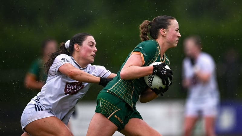 Meath's Aoibhín Cleary (R) tries to get away from Kildare's Lauren Murtagh