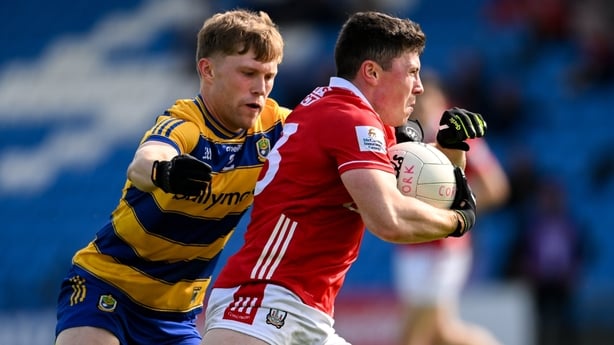 14 June 2025; Mark Cronin of Cork in action against Pearse Frost of Roscommon during the GAA Football All-Ireland Senior Championship Round 3 match between Roscommon and Cork at Laois Hire O'Moore Park in Portlaoise, Laois. Photo by Daire Brennan/Sportsfile