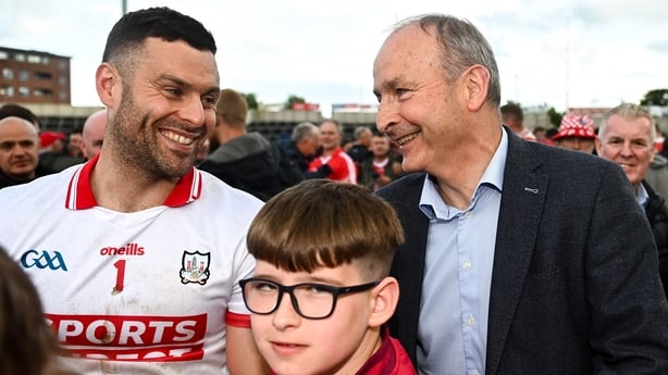 14 June 2025; Míchéal Aodh Martin of Cork celebrates with his dad An Taoiseach Míchéal Martin TD after the GAA Football All-Ireland Senior Championship Round 3 match between Roscommon and Cork at Laois Hire O'Moore Park in Portlaoise, Laois. Photo by Daire Brennan/Sportsfile