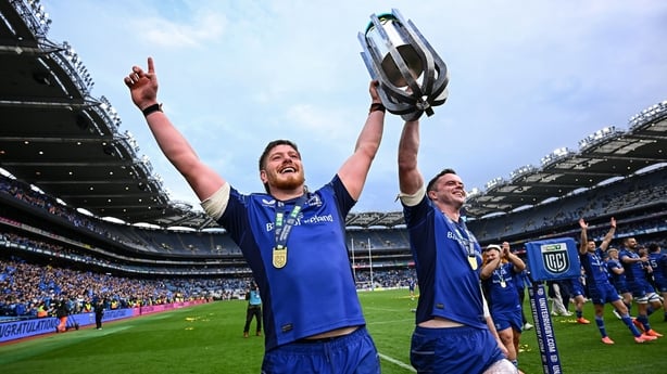14 June 2025; Leinster players Joe McCarthy, left, and James Ryan celebrate with the trophy after the United Rugby Championship Grand Final match between Leinster and Vodacom Bulls at Croke Park in Dublin. Photo by Brendan Moran/Sportsfile