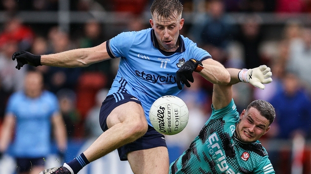 14 June 2025; Sean Bugler of Dublin in action against Derry goalkeeper Ben McKinless during the GAA Football All-Ireland Senior Championship Round 3 match between Dublin and Derry at Páirc Esler in Newry, Down. Photo by Thomas Flinkow/Sportsfile
