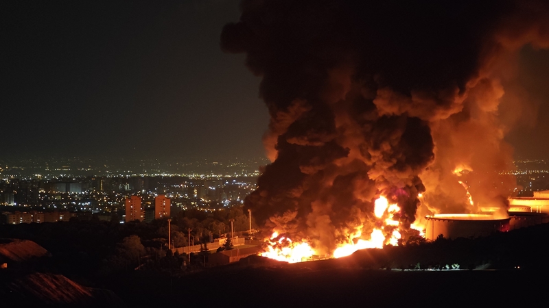 Fire and smoke rise into the sky after an Israeli attack on the Shahran oil depot in Tehran, Iran