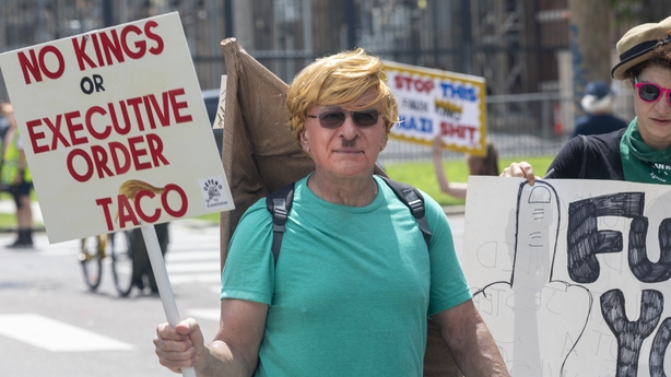 New Orleans, LA, USA - JUNE 14: Protesters parade through the Marigny neighborhood of New Orleans, LA in support of the nationwide No Kings Protest against President Donald Trump, on June 14, 2025. (Photo by Patt Little/Anadolu via Getty Images)
