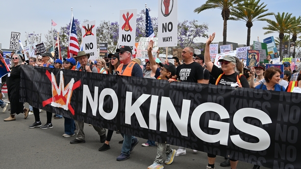 SAN DIEGO, CALIFORNIA - JUNE 14: Protesters attend the 'No Kings' rally in San Diego, California on Saturday, June 14, 2025, on the same day as President Trump's military parade in Washington, DC. In response to the military parade celebrating the 250th anniversary of the US Army but also coinciding