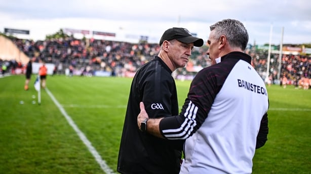 Armagh manager Kieran McGeeney, left, and Galway manager Pádraic Joyce shake hands after the GAA Football All-Ireland Senior Championship Round 3 match between Galway and Armagh at Kingspan Breffni in Cavan.