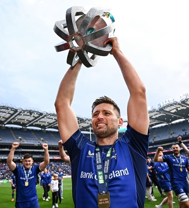 14 June 2025; Ross Byrne of Leinster celebrates with the trophy after the United Rugby Championship Grand Final match between Leinster and Vodacom Bulls at Croke Park in Dublin. Photo by Brendan Moran/Sportsfile