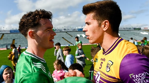 15 June 2025; Darren O'Doherty of Limerick and Eoin Porter of Wexford after the Tailteann Cup quarter-final match between Limerick and Wexford at TUS Gaelic Grounds in Limerick. Photo by Tom Beary/Sportsfile