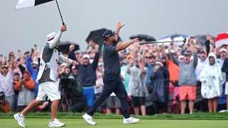 OAKMONT, PENNSYLVANIA - JUNE 15: J. J. Spaun of the United States celebrates with caddie Mark Carens after winning on the 18th green during the final round of the 125th U.S. OPEN at Oakmont Country Club on June 15, 2025 in Oakmont, Pennsylvania. (Photo by