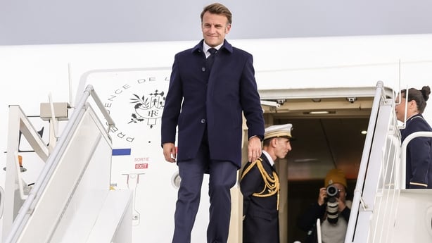 France's President Emmanuel Macron exits his aircraft upon arrival at Calgary International Airport, before the start of the G7 summit, in Calgary, Alberta, Canada, June 15, 2025. (Photo by Teresa SUAREZ / POOL / AFP)