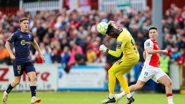 16 June 2025; St. Patrick's Athletic goalkeeper Joseph Anang heads the ball clear during the SSE Airtricity Men's Premier Division match between St Patrick's Athletic and Shelbourne at Richmond Park in Dublin. Photo by Thomas Flinkow/Sportsfile