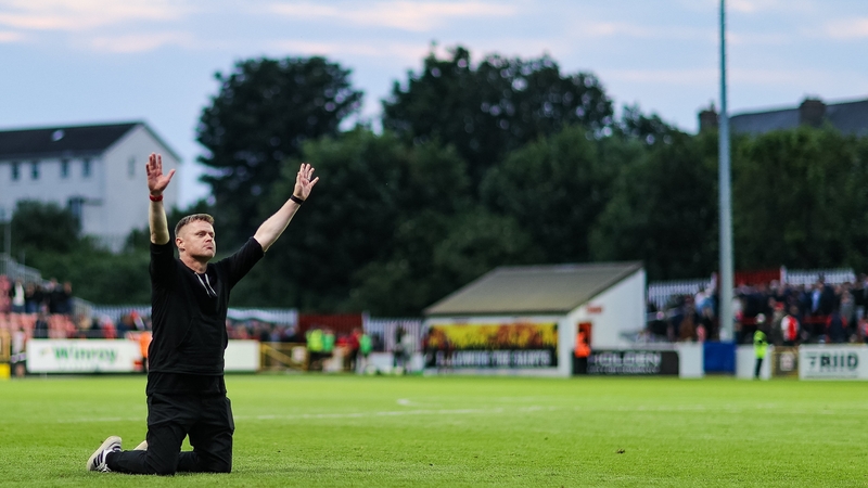 Shelbourne manager Damien Duff applauds his fans after his side's victory at Richmond Park