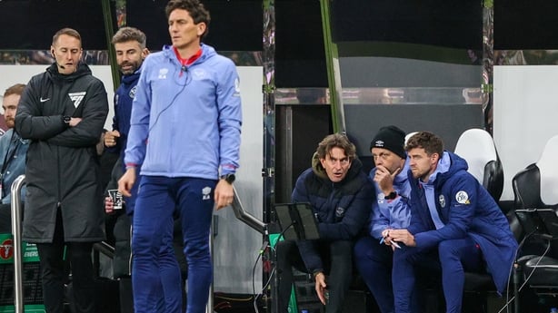 Brentford manager Thomas Frank chats to his team on the bench during the Carabao Cup Quarter Final match between Newcastle United and Brentford at St James' Park on December 18, 2024 in Newcastle upon Tyne, England.