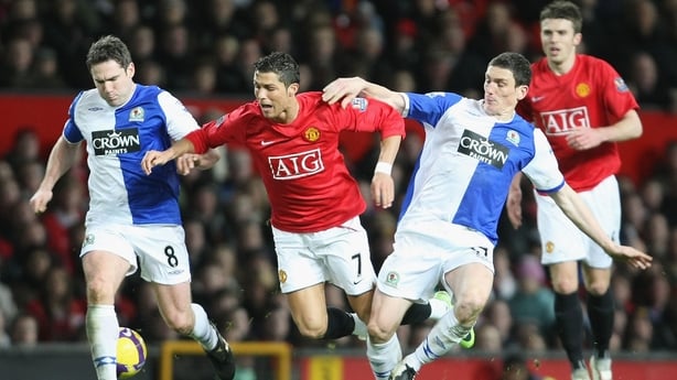 Cristiano Ronaldo of Manchester United clashes with Keith Andrews of Blackburn Rovers during the Barclays Premier League match between Manchester United and Blackburn Rovers at Old Trafford on February 21 2009, in Manchester, England. (Photo by Tom Purslow/Manchester United via Getty Images)