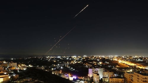 Missiles fired from Iran are seen streaking across the skies over the city of Hebron (Getty images)