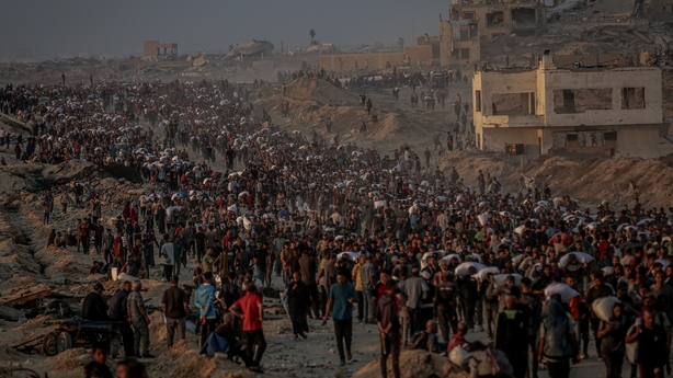 GAZA CITY, GAZA - JUNE 17: Palestinians flock to the aid center set up by the US and Israeli-led Gaza Humanitarian Relief Foundation on the Coastal Road in the Sudaniya area to receive food package in northern Gaza City, Gaza on June 17, 2025. (Photo by Saeed M. M. T. Jaras/Anadolu via Getty Images)