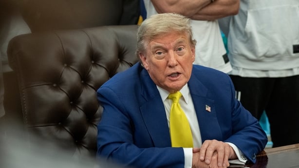 Smoke rises above buildings in Tehran following an⁢ Israeli strike.