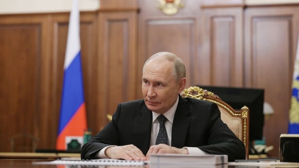 In this pool photograph distributed by Russian state agency Sputnik, Russia's President Vladimir Putin attends a meeting with Russia's state-owned defence corporation Rostec CEO in Moscow on June 17, 2025. (Photo by Gavriil GRIGOROV / POOL / AFP)