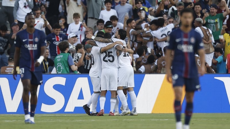 Igor Jesus of Botafogo celebrates with teammates after scoring
