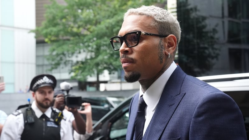 Chris Brown arriving at court in London