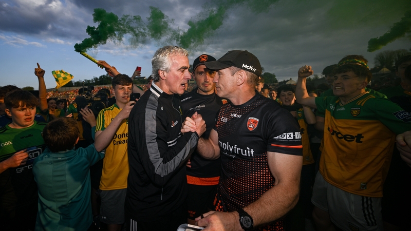 10 May 2025; Donegal manager Jim McGuinness, left, and Armagh manager Kieran McGeeney after the Ulster GAA Football Senior Championship final match between Armagh and Donegal at St Tiernach's Park in Clones, Monaghan. Photo by Ramsey Cardy/Sportsfile