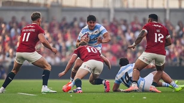 20 June 2025; Lucio Cinti of Argentina in action against Fin Smith of British & Irish Lions during the Lions 1888 Cup match between the British & Irish Lions and Argentina at the Aviva Stadium in Dublin. Photo by Ramsey Cardy/Sportsfile