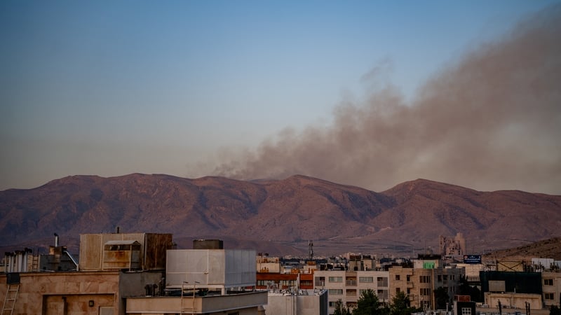 Smoke rises as fire burns following an Israeli missile strike on the mountains of Shiraz in Iran