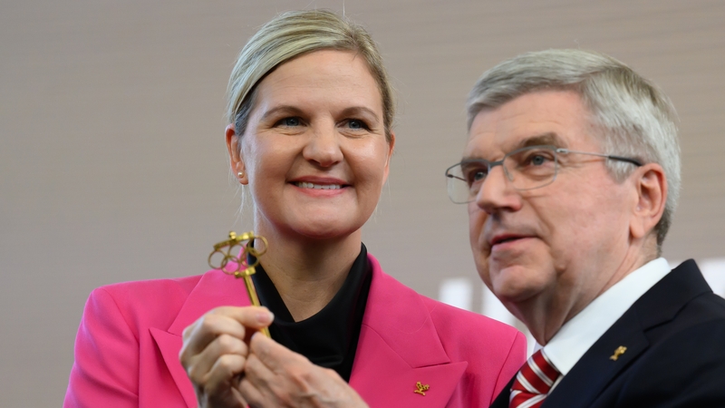 Kirsty Coventry is handed the Olympic key from outgoing International Olympic Committee (IOC) President Thomas Bach