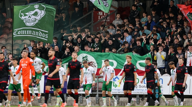 23 June 2025; Cork City supporters as players enter the pitch before the SSE Airtricity Men's Premier Division match between Cork City and Drogheda United at Turner's Cross in Cork. Photo by Thomas Flinkow/Sportsfile