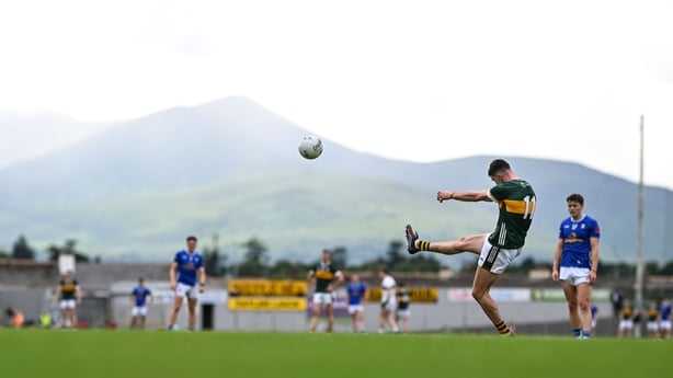 21 June 2025; Seán O'Shea of Kerry kicks a point from a free during the GAA Football All-Ireland Senior Championship preliminary quarter-final match between Kerry and Cavan at Fitzgerald Stadium in Killarney, Kerry. Photo by Brendan Moran/Sportsfile