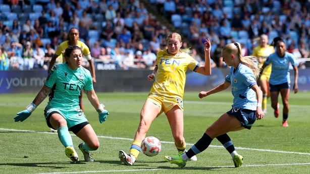 MANCHESTER, ENGLAND - MAY 10: Laura Blindkilde Brown of Manchester City shoots whilst under pressure from Shae Yanez and Hayley Nolan of Crystal Palace during the Barclays Women's Super League match between Manchester City FC and Crystal Palace at Joie Stadium on May 10, 2025 in Manchester, England.