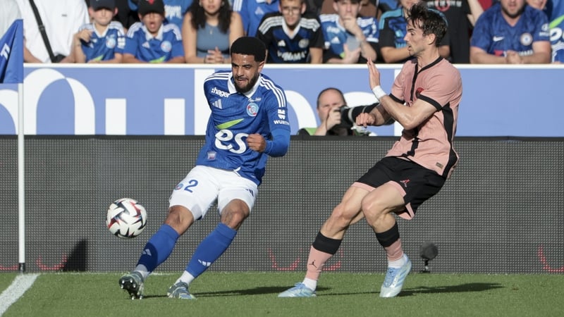 Strasbourg's Andrew Omobamidele beats PSG's Fabian Ruiz to the ball during a Ligue 1 encounter between the sides in May