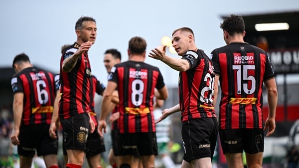 Ross Tierney of Bohemians, centre, celebrates his side's second goal scored by James Clarke, not pictured, during the SSE Airtricity Men's Premier Division match between Bohemians and Shamrock Rovers at Dalymount Park in Dublin.