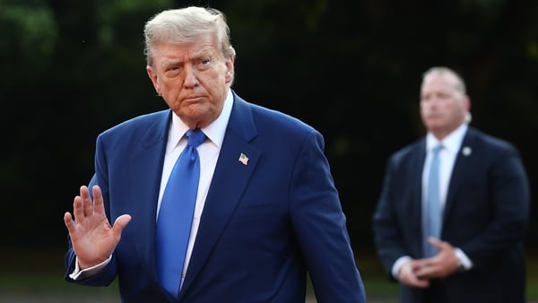 US President Donald Trump arrives to the social dinner of the NATO Summit