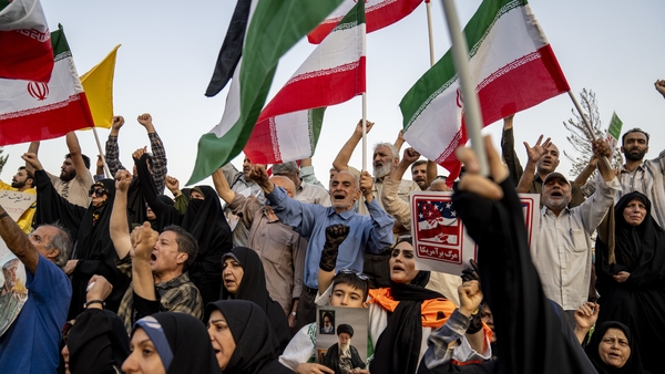 TEHRAN, IRAN - JUNE 24: Members of the public are seen during a gathering to honor Iran’s military forces, following the announcement of a ceasefire between Israel and Iran on June 24, 2025 in Tehran, Iran. Iranian authorities announced this morning they