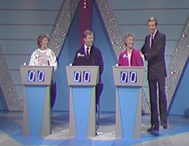 Henry Kelly with contestants on the quiz show 'Flashback' (1990)