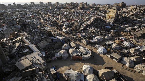 GAZA CITY, GAZA - JUNE 24: A general view of the makeshift tents housing Palestinians and buildings destroyed in Israeli attacks as deprived of basic needs such as shelter, food and clean water, Palestinians struggle to survive in difficult living conditi