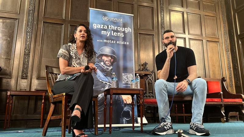 Palestinian photographer Motaz Azaiza speaks with scholar Noura Erakat during an event at the First Unitarian Church of Philadelphia on 23 June