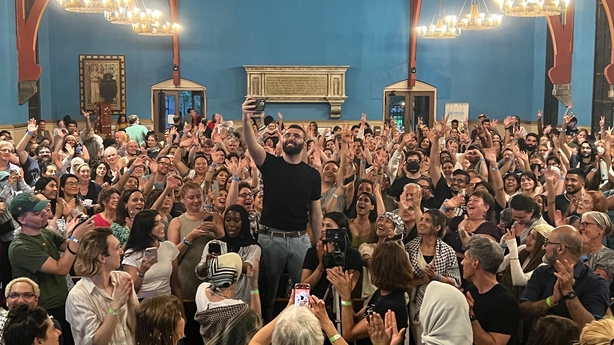 Palestinian photographer and Instagram star Motaz Azaiza in the middle of the crowd during an event at the First Unitarian Church of Philadelphia to collect donations for UNRWA