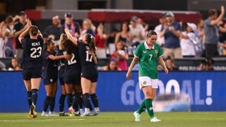26 June 2025; Tyler Toland of Republic of Ireland reacts after her side concede a third goal, scored by Rose Lavelle of United States, hidden, during the women's international friendly match between the USA and Republic of Ireland at Dick’s Sporting Goods